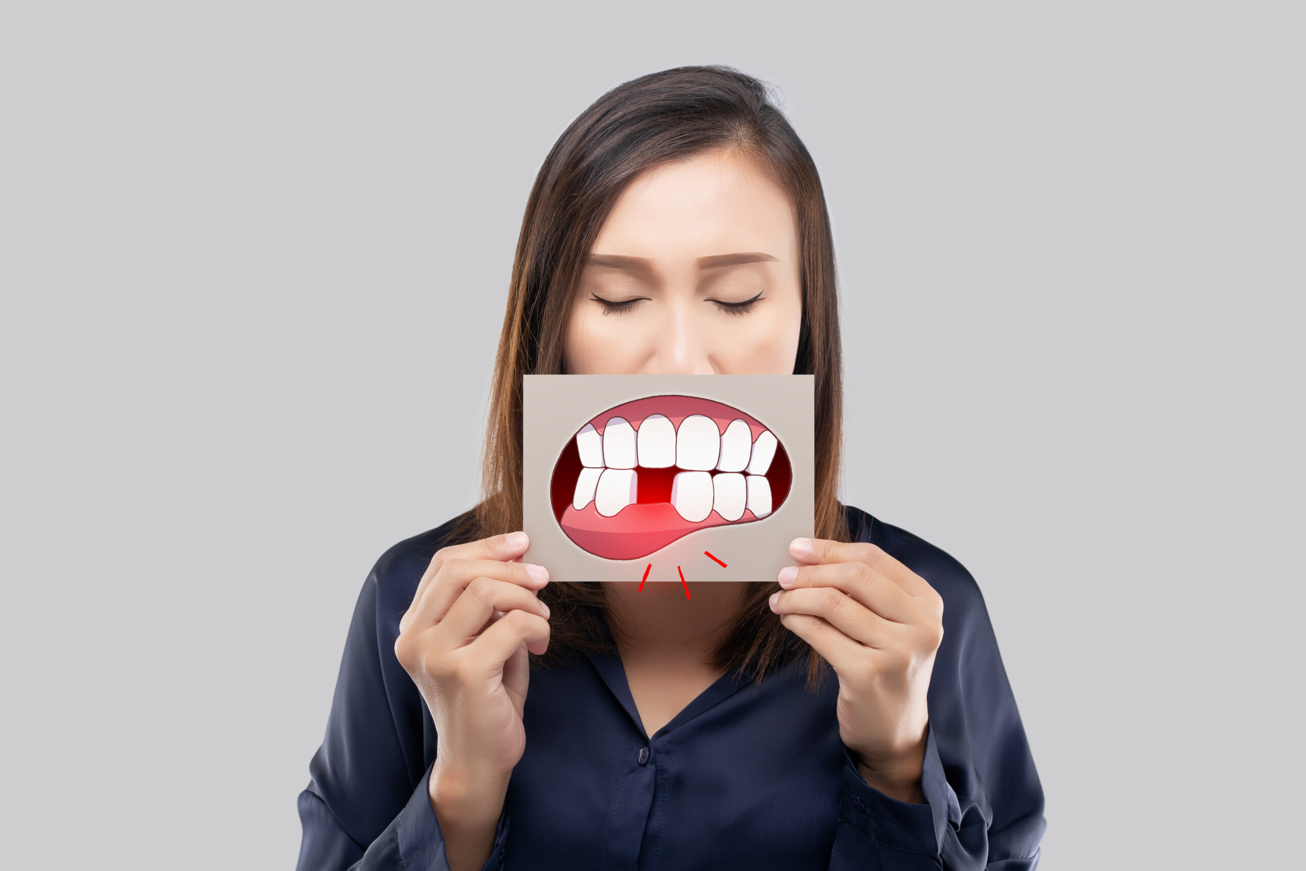 Patient experiencing a dental emergency in Keene, TX