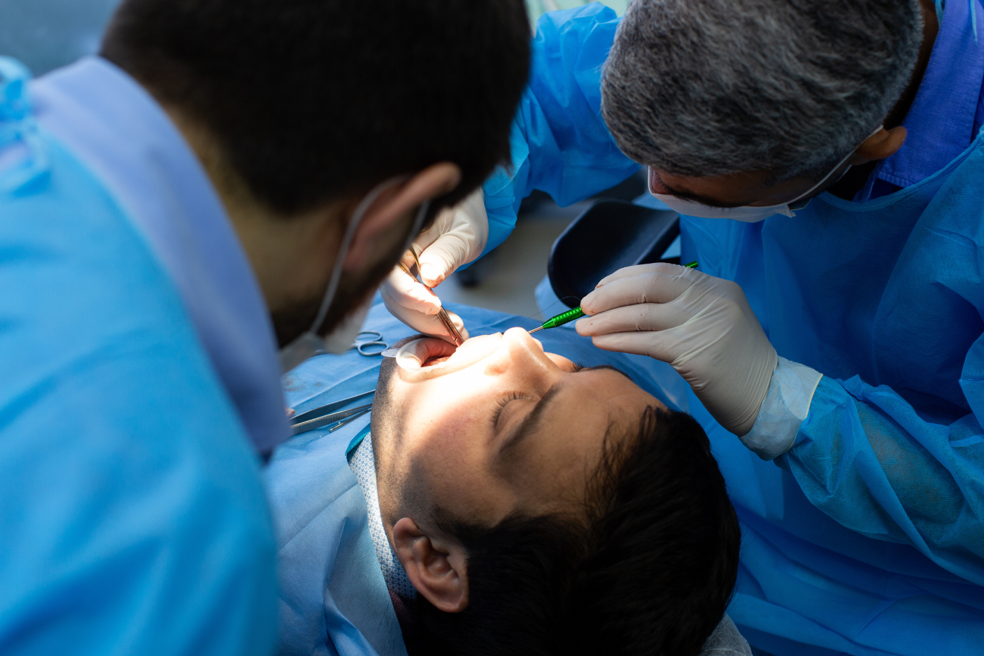 Dentist examining emergency patient near Cleburne, TX at Keene Family Dentistry